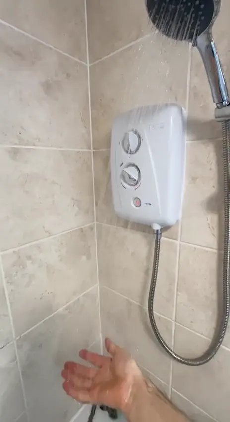 An electric shower run and tested after fitting